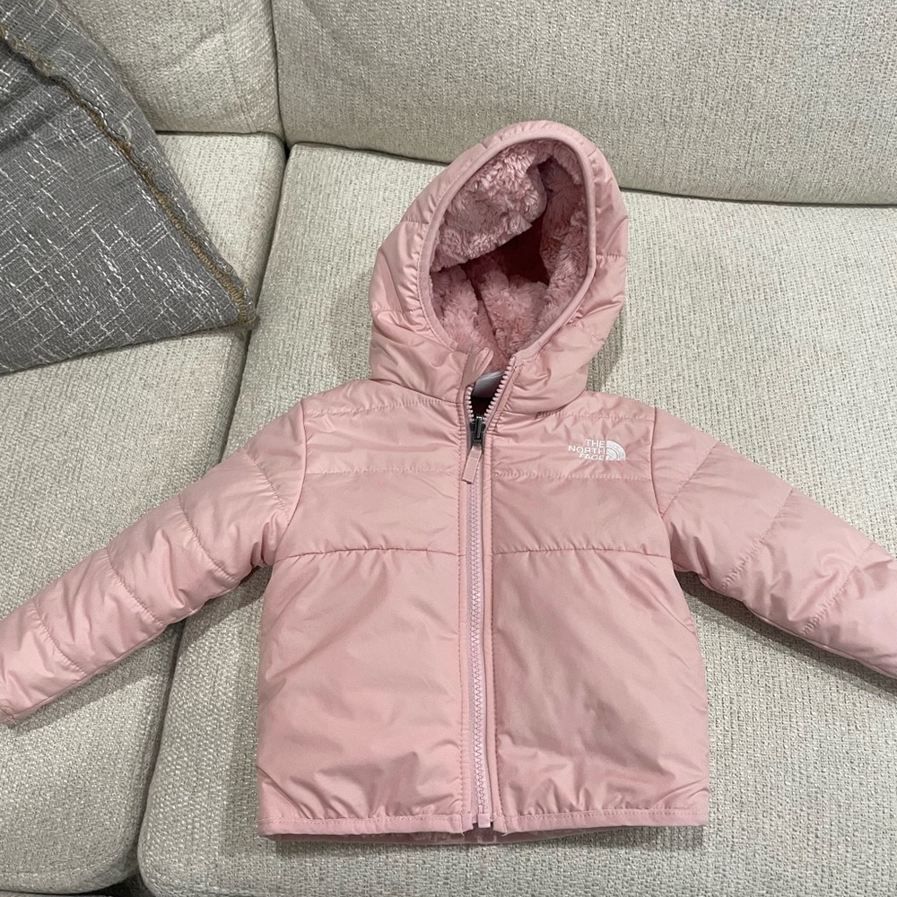 Reversible, like new baby girl north face puffer coat with fleece lining.